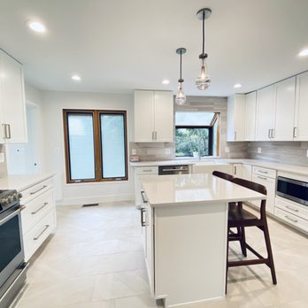 Panorama Remodeling - a clean kitchen with white cabinets - General Contractors Near Me - Vienna, Virginia