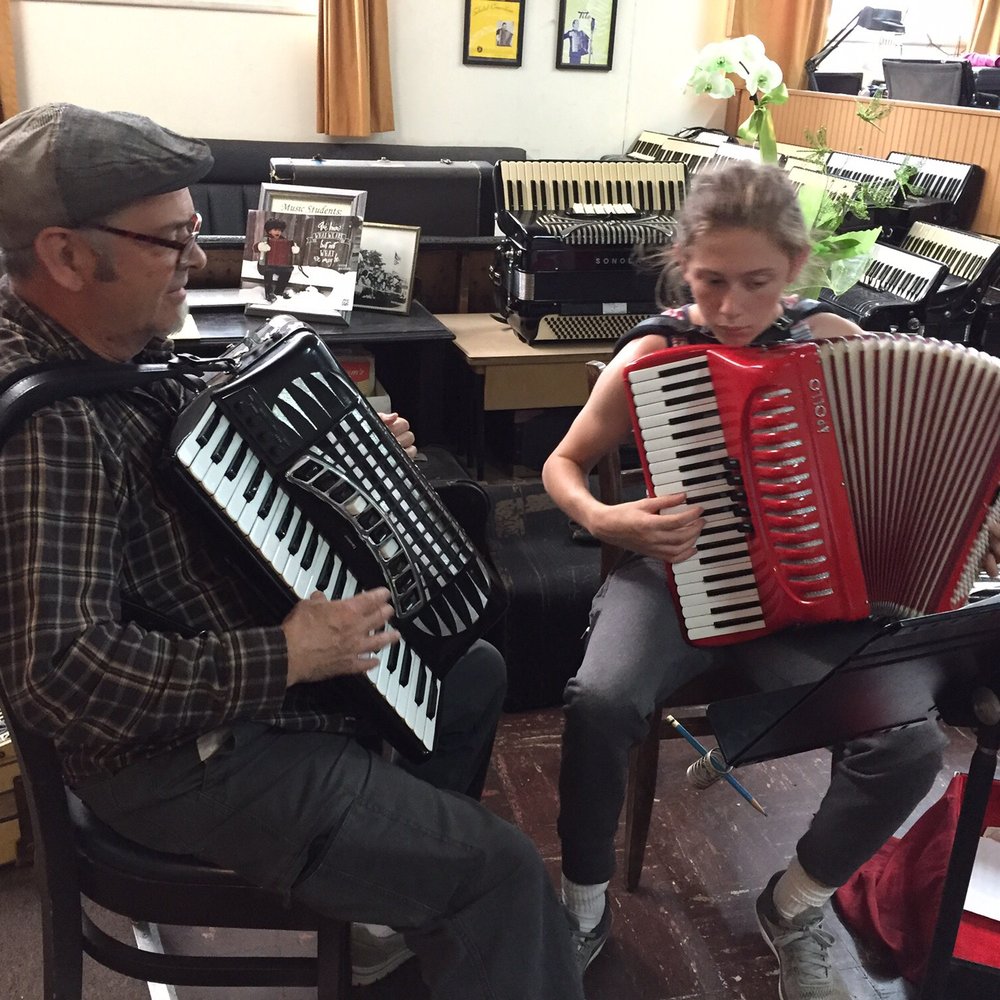 Jack and Dave playing during Jack's lesson at Dave's Accordion School Jack and Dave playing during Jack's lesson at Dave's Accordion School