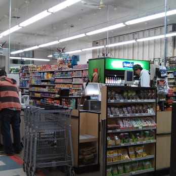Marketime Foods - people shopping in a grocery store - Grocery Near Me - Seattle, Washington