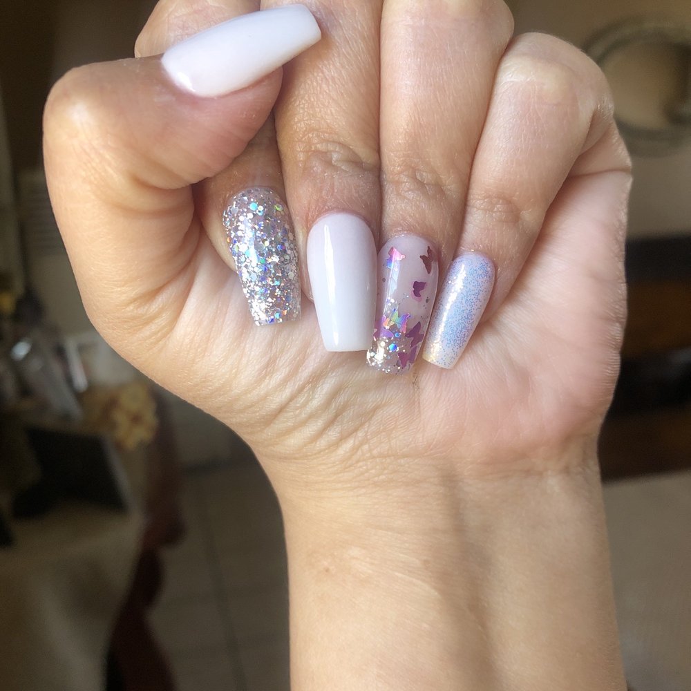 TA Nails & Spa - White powder, glitter index finger and butterflies on ring finger and fairy dust (as they call it) on the pinky. - Nail Salons Near Me - Norwalk, California TA Nails & Spa - White powder, glitter index finger and butterflies on ring finger and fairy dust (as they call it) on the pinky. - Nail Salons Near Me - Norwalk, California