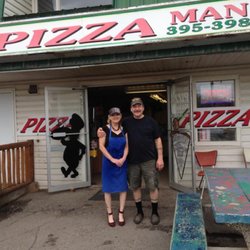 Pizza Man - Gayle & Herb at the Pizza Man store front