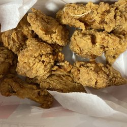 KFC - The wings after a 125 mike ride home. Still hard as a rock. They shatter when you try to eat them. Black!