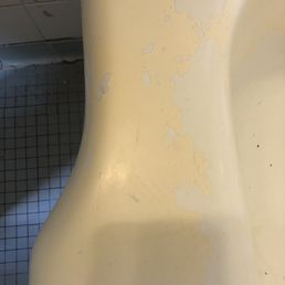 Before: Old paint on a bathtub Before: Old paint on a bathtub