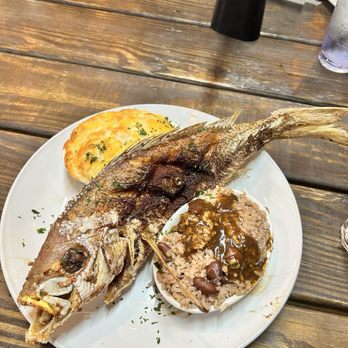 Caribbean Jerk Palace - Whole fried snapper w/ Mac and cheese and rice and peas - Caribbean Near Me - Houston, Texas Caribbean Jerk Palace - Whole fried snapper w/ Mac and cheese and rice and peas - Caribbean Near Me - Houston, Texas