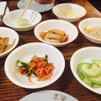 Hanbat Restaurant - all the free little dishes! I really like the kimchi.. - Korean Near Me - New York, New York