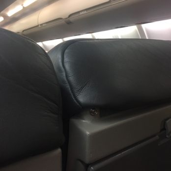 American Airlines - Worn out and cushions detached on seats - Airlines Near Me - Pearl, Mississippi