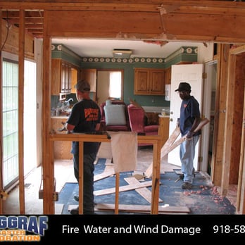 Burggraf Disaster Restoration - two men working on a house - General Contractors Near Me - Tulsa, Oklahoma Burggraf Disaster Restoration - two men working on a house - General Contractors Near Me - Tulsa, Oklahoma