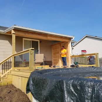 Rodman Construction - a man standing in front of a house - Decks & Railing Near Me - Jeffersonville, Indiana Rodman Construction - a man standing in front of a house - Decks & Railing Near Me - Jeffersonville, Indiana