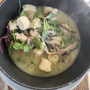 Dram Yard - Chicken and ricotta gnudi dumplings with mushrooms, Swiss chard in a lemon thyme brode and fresh herbs. - New American Near Me - Wilmington, North Carolina Dram Yard - Chicken and ricotta gnudi dumplings with mushrooms, Swiss chard in a lemon thyme brode and fresh herbs. - New American Near Me - Wilmington, North Carolina