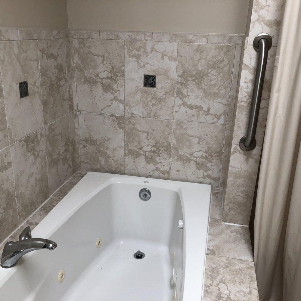 Jamie Walker & Associates - Bathroom with jacuzzi tub and shower - Real Estate Agents Near Me - Baltimore, Maryland Jamie Walker & Associates - Bathroom with jacuzzi tub and shower - Real Estate Agents Near Me - Baltimore, Maryland