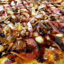 My son's creation, topped with Fig Balsamic right out of the oven. My son's creation, topped with Fig Balsamic right out of the oven.