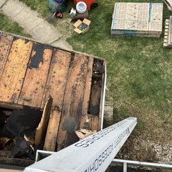 Redemption Contractors - New roof installation- showing the damaged roof that we replaced with new boards