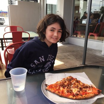 Serial Grillers - "Slice" of pizza. And a cute kid - Pizza Near Me - Tucson, Arizona Serial Grillers - "Slice" of pizza. And a cute kid - Pizza Near Me - Tucson, Arizona