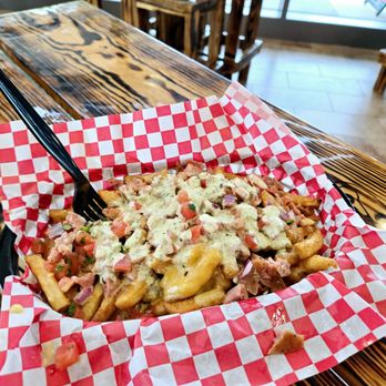 What It Do BBQ - Loaded Fries with Brisket and Sausage. Other protein options include: Chicken and Turkey. - Barbeque Near Me - Houston, Texas What It Do BBQ - Loaded Fries with Brisket and Sausage. Other protein options include: Chicken and Turkey. - Barbeque Near Me - Houston, Texas