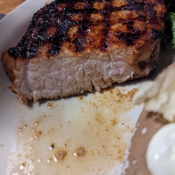Colorado's Prime Steak - a close up of a piece of meat on a plate - Steakhouses Near Me - Sanford, Florida