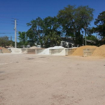 Weedo's Landscape Supply - a man standing in a dirt lot - Landscaping Near Me - Ormond Beach, Florida