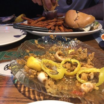 Fisher's Pub - Calamari was awesome. Most of it's already gone in the photo lol and we got stuffed quahogs too,also delicious - New American Near Me - Middleborough, Massachusetts Fisher's Pub - Calamari was awesome. Most of it's already gone in the photo lol and we got stuffed quahogs too,also delicious - New American Near Me - Middleborough, Massachusetts