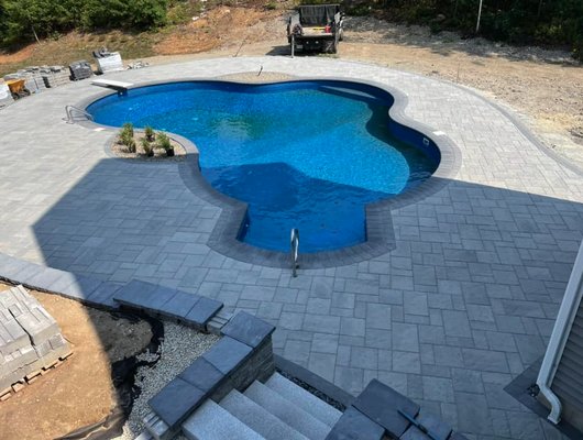 Pool Patio Paver Installation and Repair - Transform your poolside oasis with our pool patio paver installation and repair services. With three decades of specialized experience, our seasoned team brings a meticulous approach to crafting durable and visually stunning surfaces around your pool. Whether you're looking to enhance the aesthetic appeal or address wear and tear, our expertise covers everything from the initial design to the seamless installation and meticulous repair of pool patio pavers. We understand that these spaces should not only complement the natural beauty of your pool but also withstand the rigors of weather and time. Trust us to create a functional and inviting environment that blends seamlessly with your outdoor retreat, ensuring your pool patio remains a source of enjoyment for years to come. Pool Patio Paver Installation and Repair - Transform your poolside oasis with our pool patio paver installation and repair services. With three decades of specialized experience, our seasoned team brings a meticulous approach to crafting durable and visually stunning surfaces around your pool. Whether you're looking to enhance the aesthetic appeal or address wear and tear, our expertise covers everything from the initial design to the seamless installation and meticulous repair of pool patio pavers. We understand that these spaces should not only complement the natural beauty of your pool but also withstand the rigors of weather and time. Trust us to create a functional and inviting environment that blends seamlessly with your outdoor retreat, ensuring your pool patio remains a source of enjoyment for years to come.