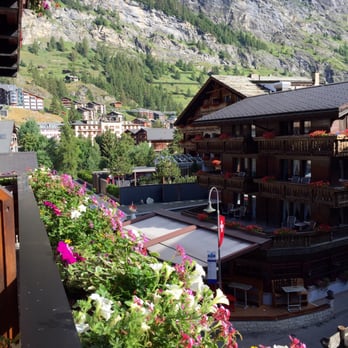 Tradition Julen Hotel - View from room 202 outside private balcony seating area - Hotels Near Me - Zermatt, VS