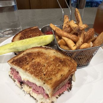 Friedman's - Pastrami Reuben with fries and an iced tea. - New American Near Me - New York, New York Friedman's - Pastrami Reuben with fries and an iced tea. - New American Near Me - New York, New York