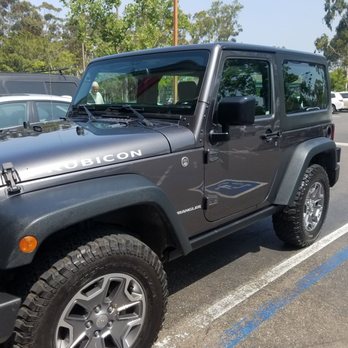 Chevron - a jeep parked in a parking lot - Gas Stations Near Me - San Diego, California Chevron - a jeep parked in a parking lot - Gas Stations Near Me - San Diego, California