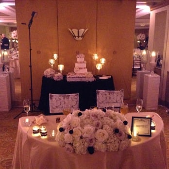 Monarch Weddings - Sarah Berger and William Brady Flowers wedding at the La Valencia Hotel in La Jolla, CA on June 22, 2013 - Wedding Planning Near Me
