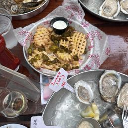 Oysters and waffle fries Oysters and waffle fries