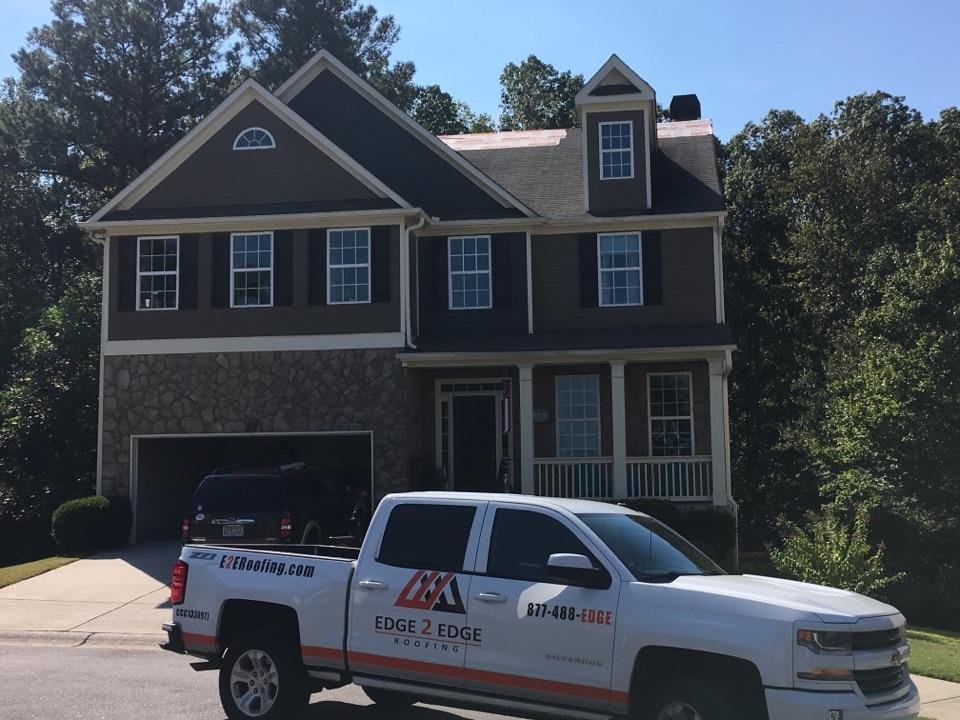 Slide of Edge 2 Edge Roofing