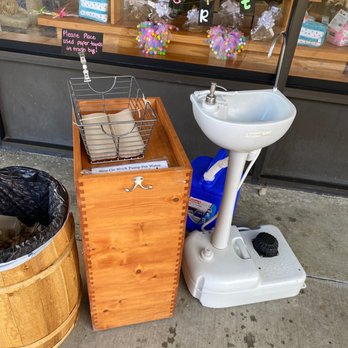 Mud Bay - Hand washing station outside MudBay. Could they be more awesome!! - Pet Stores Near Me - Tigard, Oregon