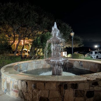 Trattoria Lisina - Close up of the fountain at Trattoria Lisina at night - Italian Near Me - Driftwood, Texas Trattoria Lisina - Close up of the fountain at Trattoria Lisina at night - Italian Near Me - Driftwood, Texas