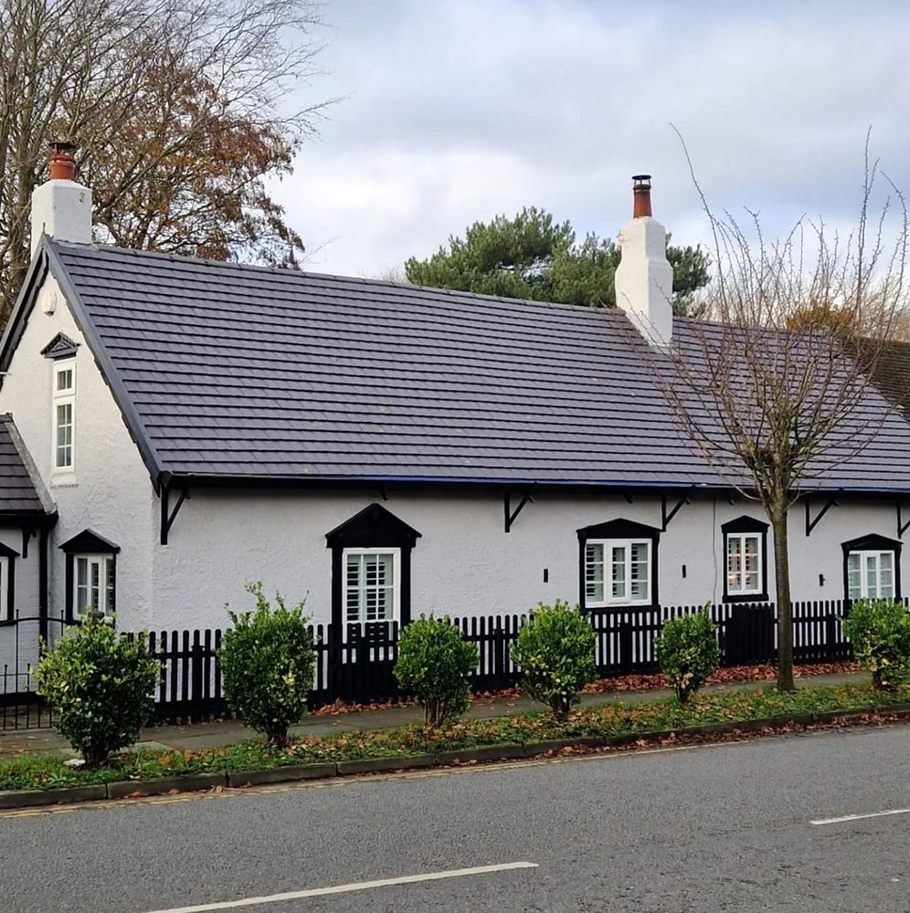 Slide of North Shattuck Roofing