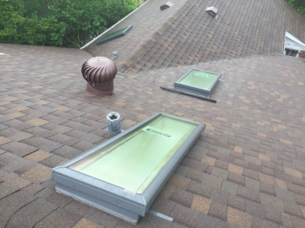 Slide of Ford Roofing Service