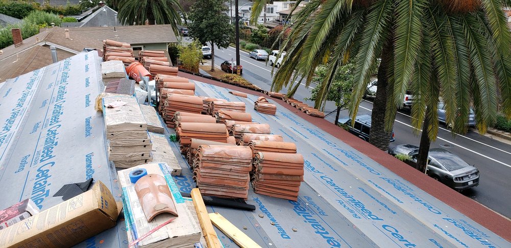 Slide of Al's Roofing & Gutters