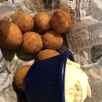 Miller's Waterfront Restaurant - Hush puppies w/ butter - Seafood Near Me - Nags Head, North Carolina Miller's Waterfront Restaurant - Hush puppies w/ butter - Seafood Near Me - Nags Head, North Carolina