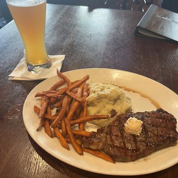 Houlihan's - Strip steak with mashed potatoes and sweet potato fries - Bars Near Me - Secaucus, New Jersey