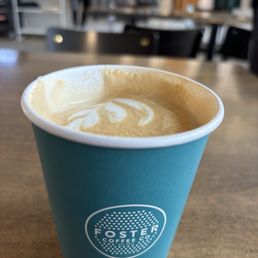 Latte with several sips taken already.
