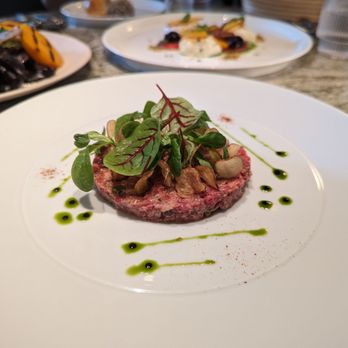 Le Jardinier - BEEF TARTARE, NASTURTIUMS, CAPERS, POTATO CHIPS, SPICY AIOLI - French Near Me - New York, New York