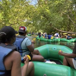 Whitewater Rafting Adventures - Working our way through a small vegetation covered shortcut!