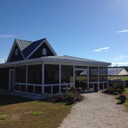 The tasting porch (outside tables are available when drinking wine by the glass or eating oysters).