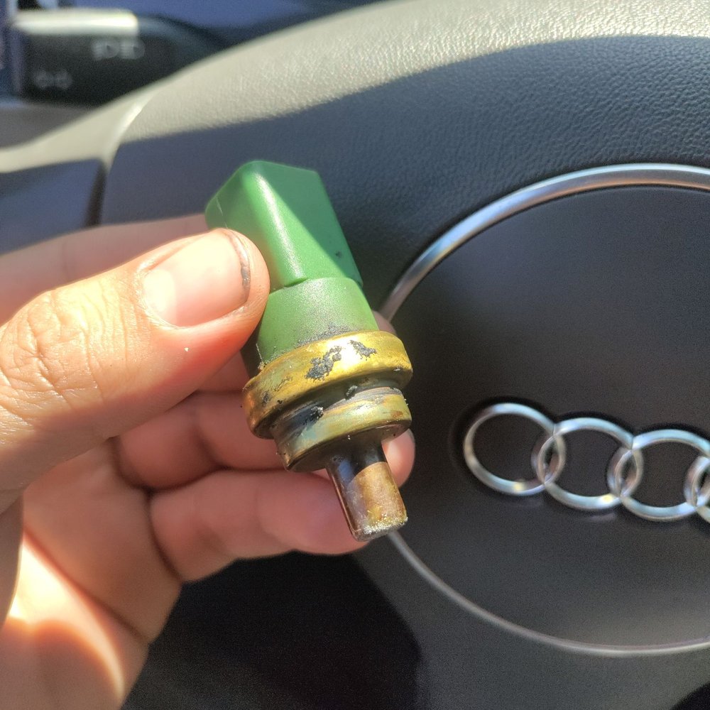 Supreme Auto Repair - Failed "Genuine" temp sensor with black silicone residue. - Auto Repair Near Me - El Cajon, California