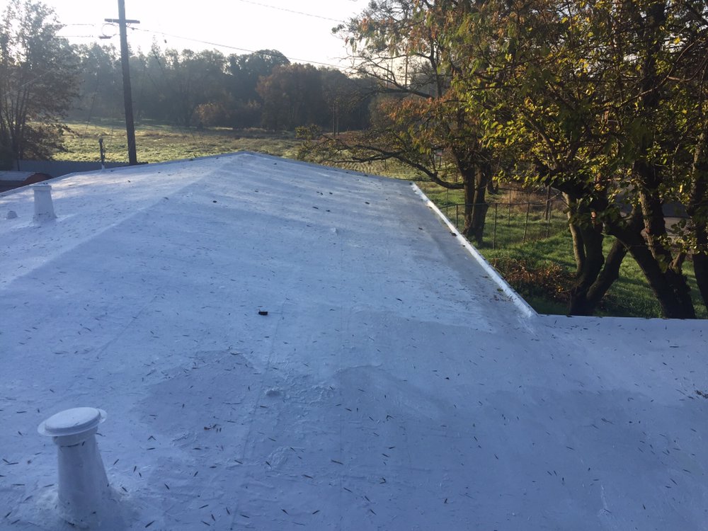 Slide of New World Roofing and Waterproofing