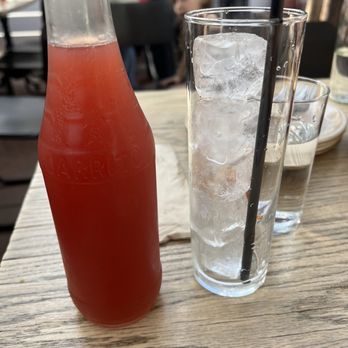 Hermanito - Tropical corazón served in bottle - Mexican Near Me - Los Angeles, California