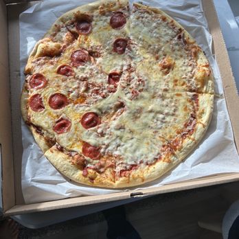 Sharky's - Half pepperoni and half cheese... hmm there must of been a pepperoni shortage or something. $20.00 bucks. Would you? - American Near Me - Fort Pierce, Florida