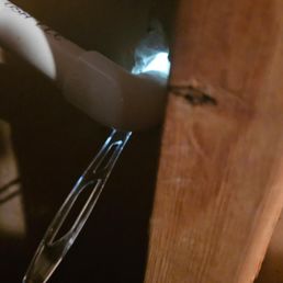 A plastic spoon was used to hold the pipping in place.  Very unprofessional