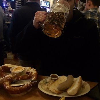 Old German Beer Hall - Pretzel with awesome garlic and cheese dip. Also 1 liter beers and a poached veal brat - Pubs Near Me - Milwaukee, Wisconsin