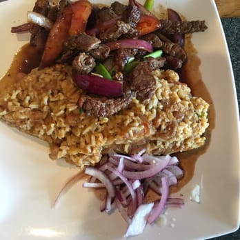 Lima Criolla Peruvian Restaurant - The bean & rice "pancake" with beef - Latin American Near Me - Austin, Texas
