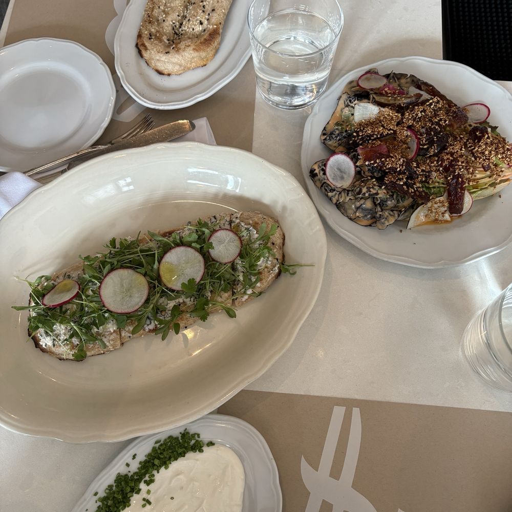 Sofreh - Shiraz salad, shallots and yogurt, sofreh bread, and feta/herb flat bread - Persian/Iranian Near Me - Brooklyn, New York Sofreh - Shiraz salad, shallots and yogurt, sofreh bread, and feta/herb flat bread - Persian/Iranian Near Me - Brooklyn, New York