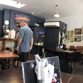 Dragonfly Cafe - a man standing in the middle of a restaurant - Sandwiches Near Me - Salmo, British Columbia
