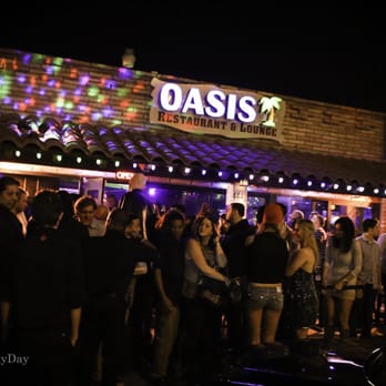 Oasis - Bar Hookah Eats - a crowd of people outside - Hookah Bars Near Me - Scottsdale, Arizona Oasis - Bar Hookah Eats - a crowd of people outside - Hookah Bars Near Me - Scottsdale, Arizona