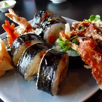 Midori's Floating World Cafe - Shrimp tempura roll (left) and spider roll (right) - Sushi Bars Near Me - Minneapolis, Minnesota Midori's Floating World Cafe - Shrimp tempura roll (left) and spider roll (right) - Sushi Bars Near Me - Minneapolis, Minnesota